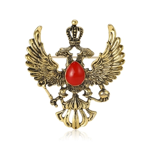 Vintage gold alloy double-headed eagle brooch with crown and red teardrop crystal