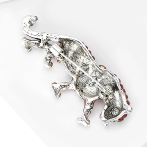 Silver leopard brooch back view showing secure safety pin clasp and metal alloy texture