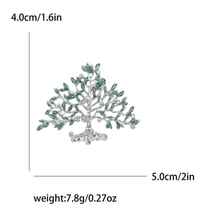 Vue détaillée d'une broche Arbre de Vie avec feuilles en émail vert et dimensions de 4,0x5,0 cm