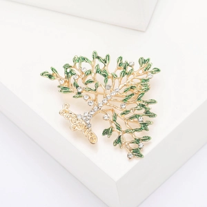 Broche arbre de vie élégante avec feuilles en émail vert et strass en cristal scintillants