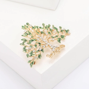 Broche arbre de vie élégante avec feuilles en émail vert et cristaux étincelants