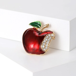 Elegant red enamel apple brooch with white crystals on a gold base for women