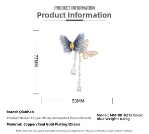 Détails et dimensions de la broche papillon avec ailes bleues et glands en zircone cubique