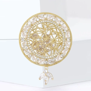 Broche ajourée élégante en plaqué or avec zircons marquise et pendentif suspendu