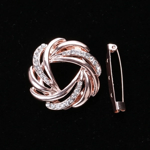 Vintage rose gold swirl brooch with pavé rhinestones for scarves and elegant outfits