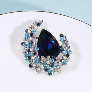 Luxury crescent crystal brooch with blue teardrop stone for coats and suits
