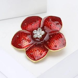 Broche fleur de pavot rouge à bords dorés et centre de cristal étincelant de mode