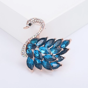 Elegant rose gold swan brooch with deep blue crystals and white rhinestones decoration