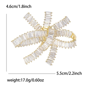 Sparkling copper bow brooch with cubic zirconia crystals, size dimensions 5.5cm by 4.6cm
