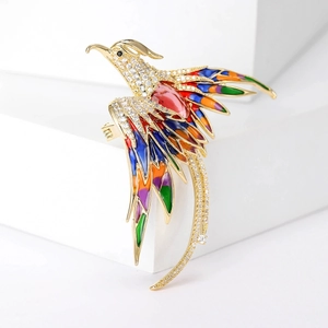 Luxurious phoenix brooch with colorful enamel, sparkling zircon stones and a red ruby center