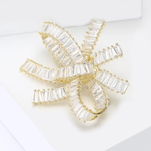 Luxury gold ribbon brooch with baguette-cut cubic zirconia for women suit and evening dress