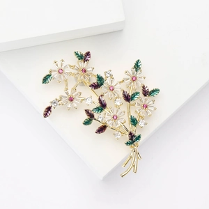 Broche élégante bouquet de marguerites avec pierres en zircon et émail sur métal doré