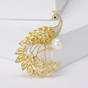 Luxurious peacock brooch featuring yellow marquise zircons and elegant white pearl