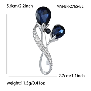 Détails de la broche tulipe en cristal avec dimensions: hauteur 5,6cm et largeur 2,7cm