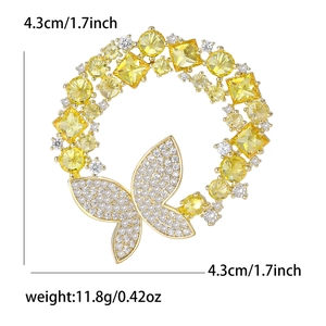 Élégante broche couronne de cristal jaune avec détail papillon argenté pour femme