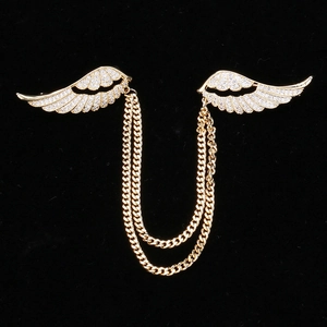 Broche ailes d'ange dorées de luxe ornée de zircons blancs et de doubles chaînes pendantes