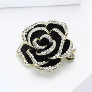 Broche camélia élégante en émail noir avec placage d'or et cristaux brillants
