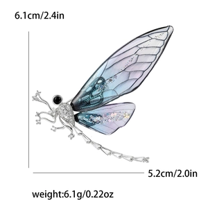 Luxury dragonfly brooch with silver frame, blue gradient wings and sparkling cubic zirconia