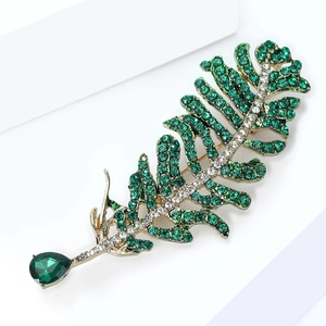 Exquisite gold-plated leaf brooch with sparkling green rhinestones for suits