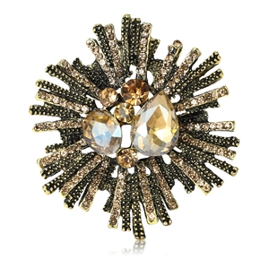 Luxurious vintage baroque brooch with champagne crystals and radiant rhinestone details