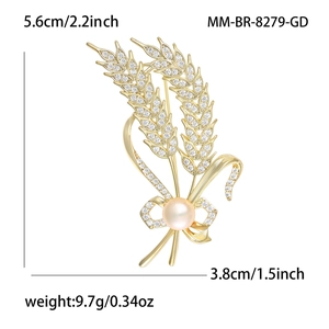 Broche élégante épi de blé avec perle, zircons pavés et détail de nœud en finition or
