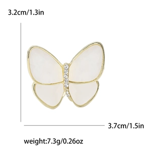 Broche papillon élégante en émail blanc et zircons, dimensions de 3,7 x 3,2 cm