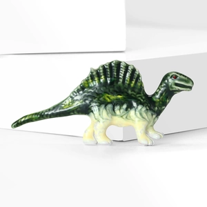 Detailed view of a green marbled glass Spinosaurus figurine with red accents on a white stand