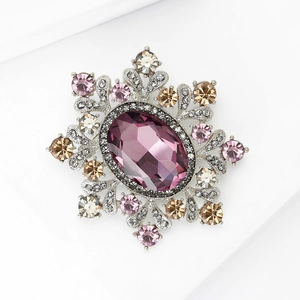 Vintage silver brooch with large purple oval crystal and multi-color floral accents