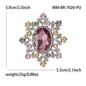 Luxurious vintage snowflake brooch with large purple crystal and multicolor gemstones