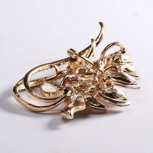 Retro gold alloy brooch with colorful rhinestones and secure rotating pin clasp