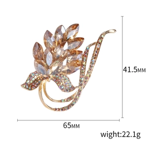 Vintage floral brooch with champagne crystals and colorful rhinestones on gold base