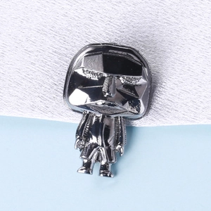 Polished silver-grey alloy lapel pin featuring a minimalist geometric icon character design