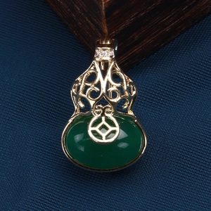 Detailed view of s925 silver hollow gourd earring with green nephrite jade and diamonds
