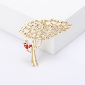 Broche en forme d'arbre doré et oiseau rouge pour costume avec finition métallique