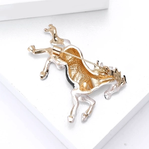 Detailed back view of horse brooch showing metal texture and secure pin clasp mechanism