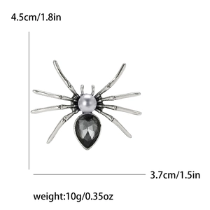 Detail view of retro spider brooch showing 4.5cm by 3.7cm size and 10g weight specs