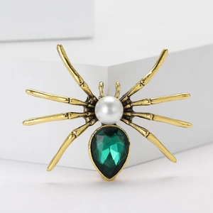 Vintage gold spider brooch with green teardrop crystal and white pearl for suits