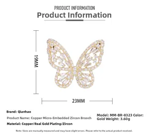Vue détaillée de la broche papillon en or 19x23mm avec pierres de zircone micro-pavées