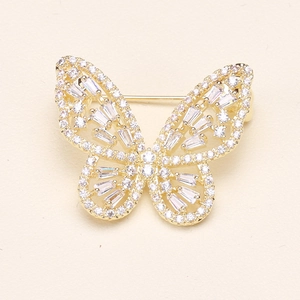 Élégante broche papillon dorée avec zircons blancs scintillants et ailes évidées