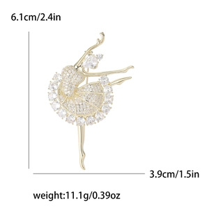 Élégante broche ballerine dorée avec zircons blancs, dimensions 6,1cm par 3,9cm
