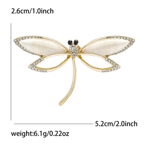 Detailed dragonfly brooch dimensions 5.2x2.6cm with white cat eye stones and gold alloy