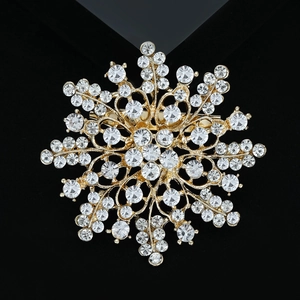 Elegant gold-tone snowflake brooch with sparkling rhinestones for women dress or suit
