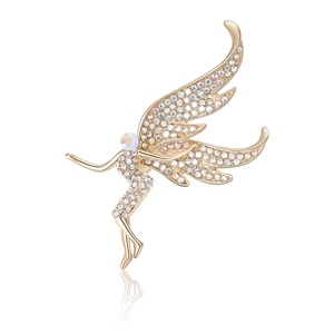 Exquisite golden fairy brooch with zircon wings in a dynamic flying pose on white background