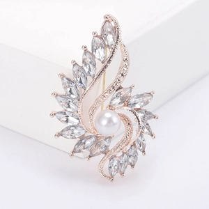 Elegant rose gold brooch with white pearl and marquise crystal leaf details