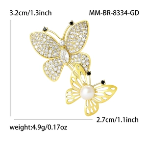 Fashionable golden double butterfly brooch with sparkling zircon and white pearl accent