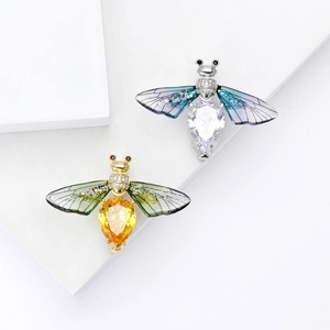 Exquisite bee brooches with gold and silver bases featuring zircon wings and gemstones
