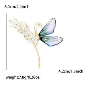 Gold butterfly wheat brooch with purple zircon wings and dimensions 6.0x4.2cm