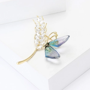 Elegant wheat ear and butterfly brooch with blue-purple gradient wings and zircon crystals