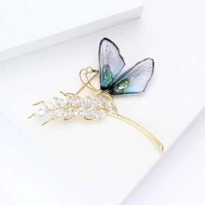 Elegant gold dragonfly and wheat brooch with gradient wings and marquise crystals