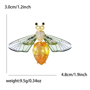 Gold bee brooch with yellow pear-shaped stone and green wings, size 4.8cm x 3.0cm